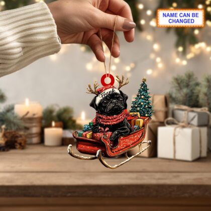 Alternative view of Custom Name Black Pug With Santa Hat Sitting On A Red Sleigh Ornament